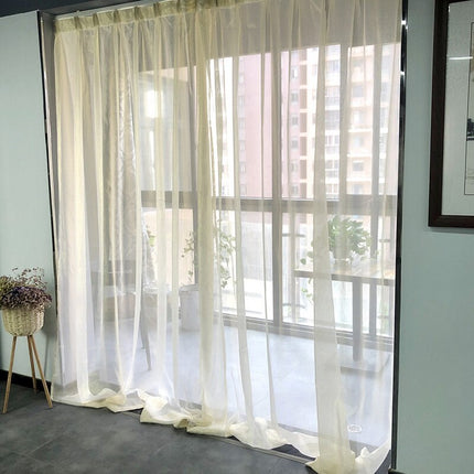 Tynn gardin med glitrende effekt