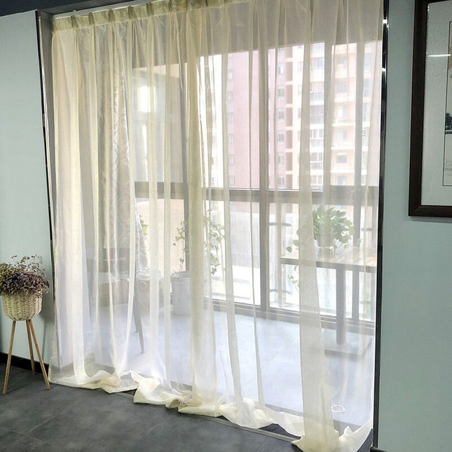 Tynn gardin med glitrende effekt