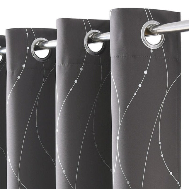 Grå lystett gardin med sølvdetaljer