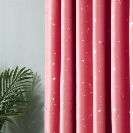 Rosa lystett gardin med stjernemotiv