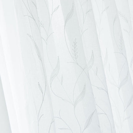 Lett gardin med botanisk mønster