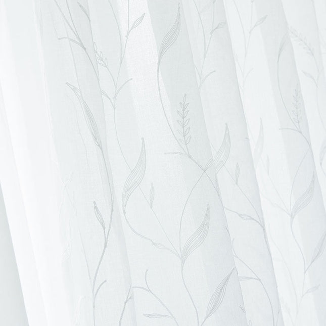 Lett gardin med botanisk mønster