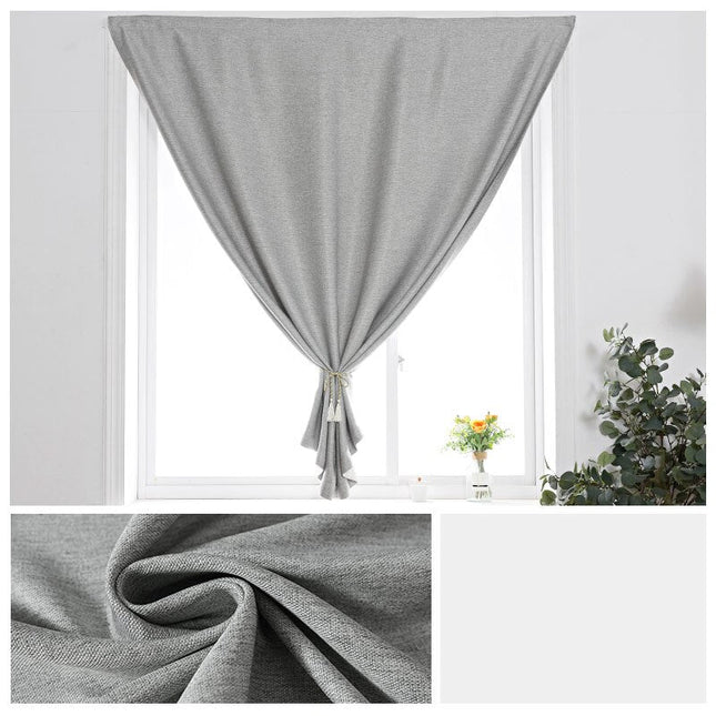 Grå gardin med borrelåsfeste