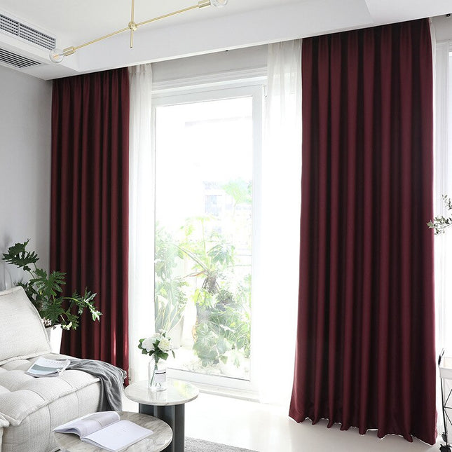 Ensfarget vinrød lystett gardin stue