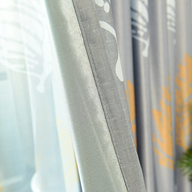 Gardin med gyllent bladmotiv