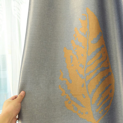 Gardin med gyllent bladmotiv