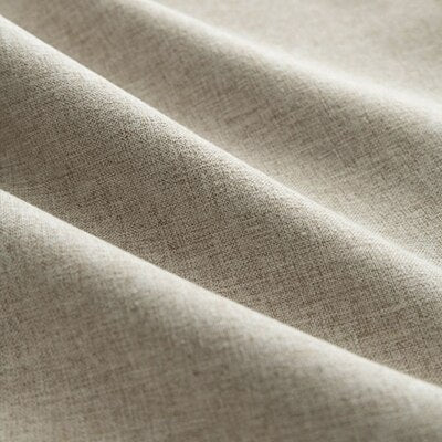 Beige lystett gardin med linstruktur