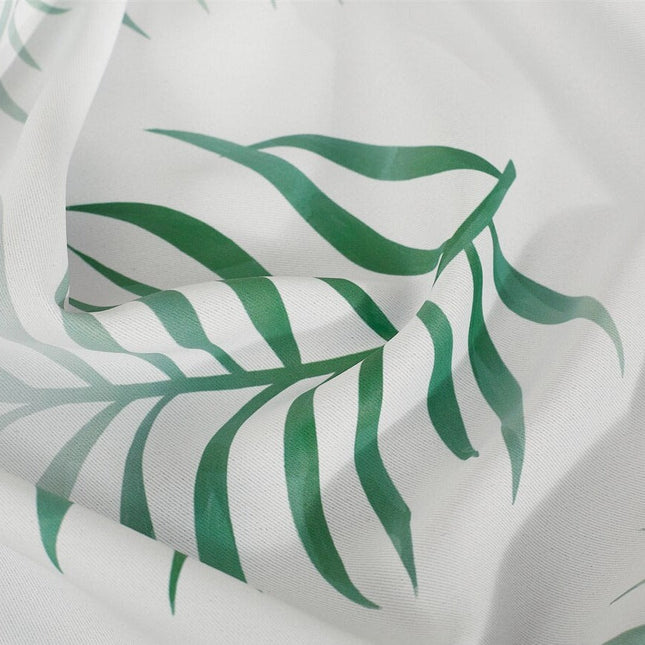 Hvit gardin med grønt palmebladmønster
