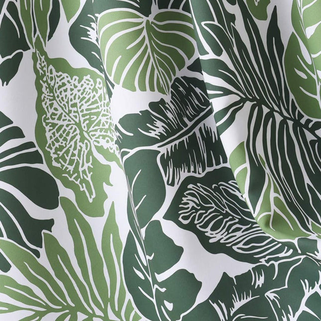 Kort gardin med tropisk bladmønster