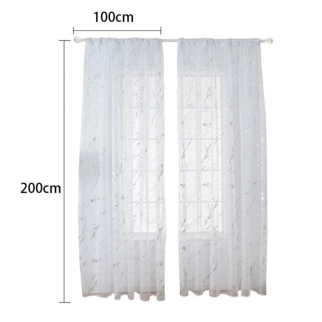 Gjennomsiktig voilegardin med gullmønster