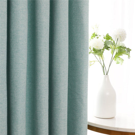 Halv-lystett gardin i en turkis farge