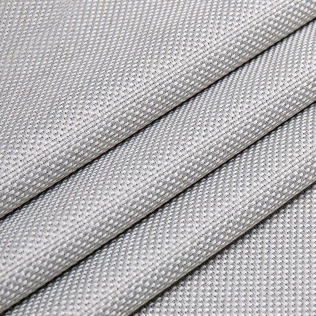 Grå gardin med strukturert vev