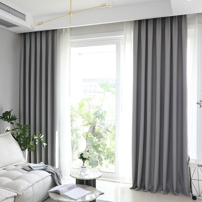 Ensfarget grå lystett gardin for stue