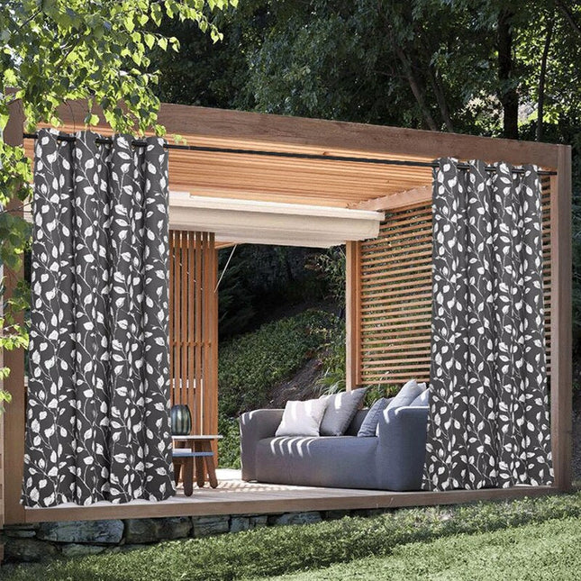 Mørk utendørs gardin med bladmønster