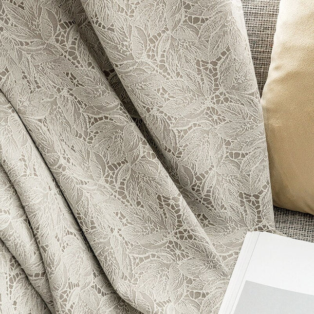 Kremhvit lystett gardin med teksturmønster