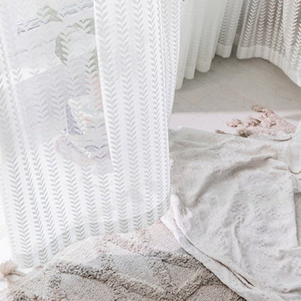 Lysfiltrerende gardin med fiskebeinsmønster