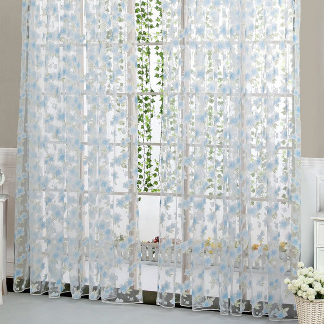 Tynn gardin med lyseblått blomstermotiv