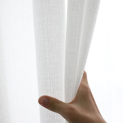 Florlett gardin med fin vevstruktur