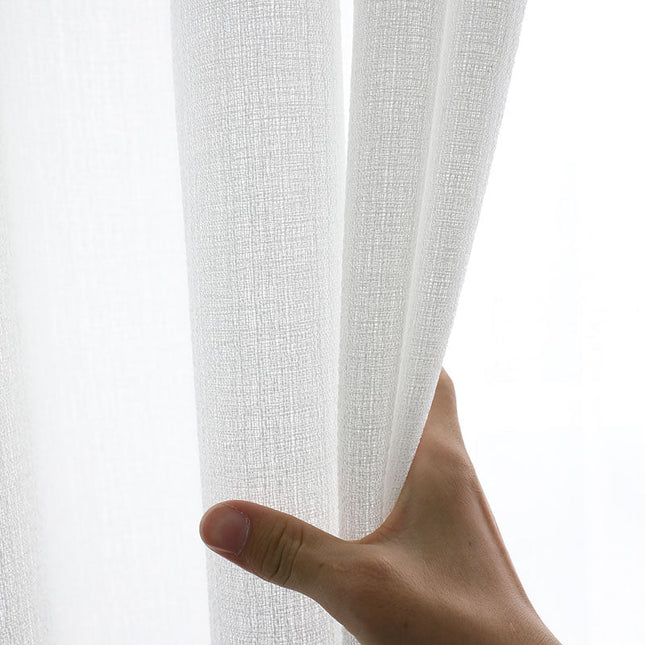 Florlett gardin med fin vevstruktur