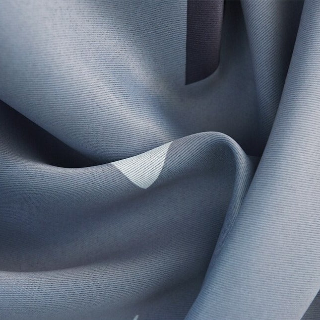 Gardin med geometrisk trekantmønster