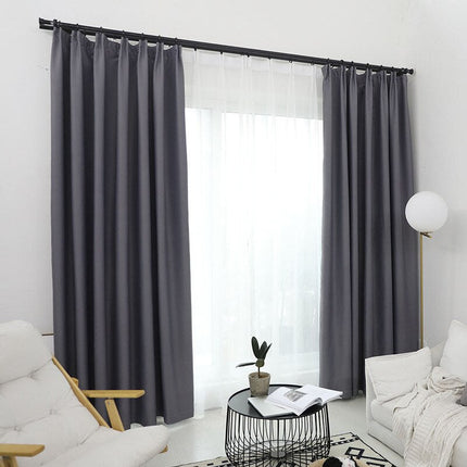 Antrasittgrå mørkleggingsgardin med maljer