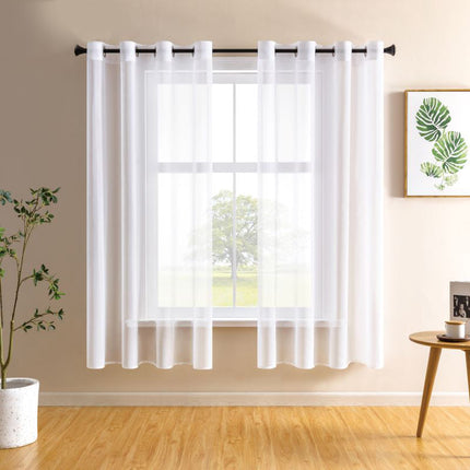 Lysfiltrerende tynn gardin med maljer