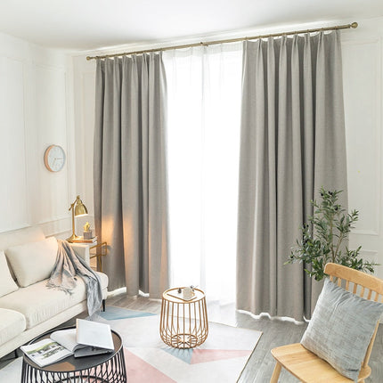 Beige lystett gardin med struktur