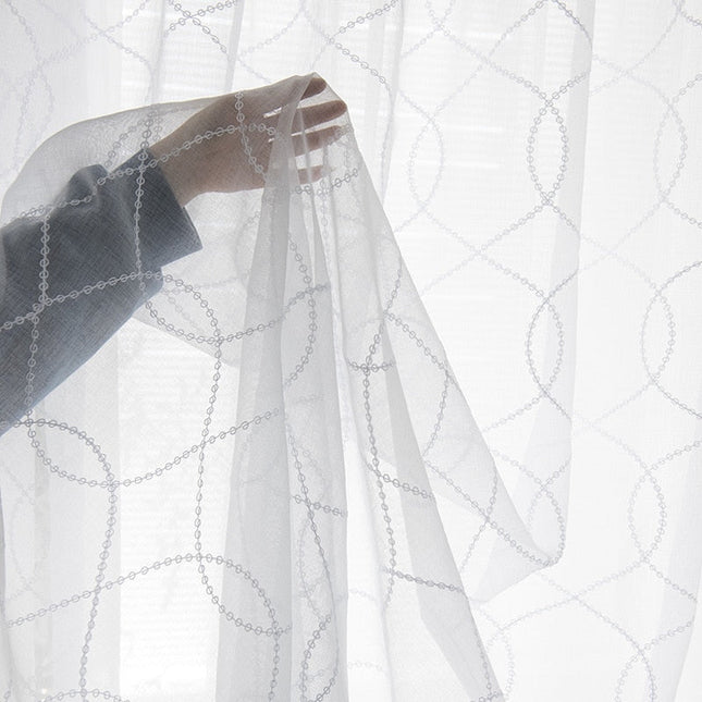 Moderne tyllgardin med geometrisk sirkelmønster