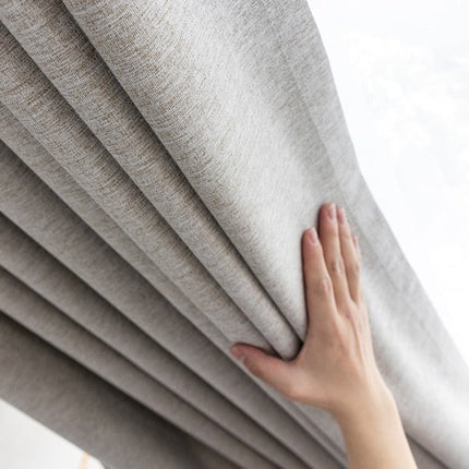 Beige lystett gardin med struktur