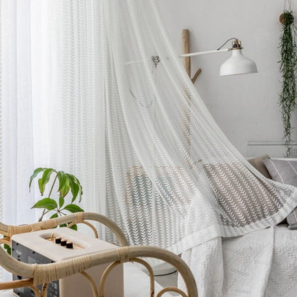 Lysfiltrerende gardin med fiskebeinsmønster