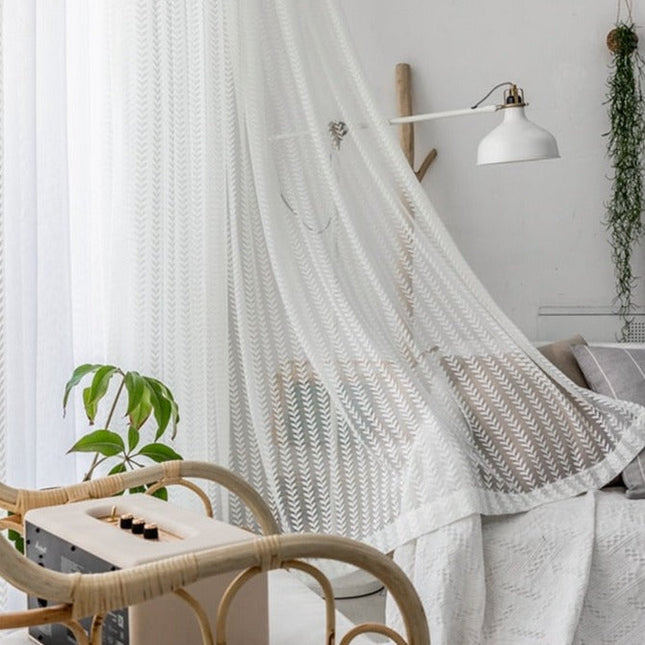 Lysfiltrerende gardin med fiskebeinsmønster