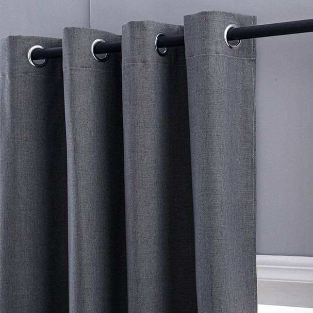 Antrasittgrå lystett gardin med linstruktur