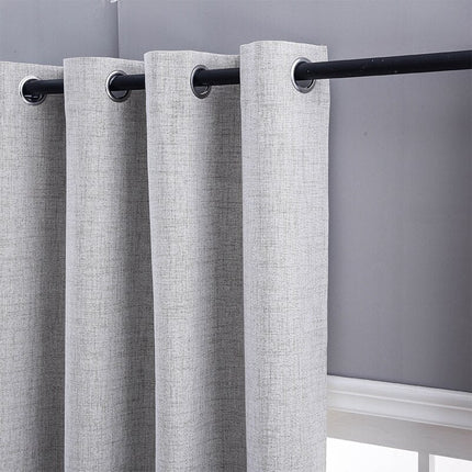Lysegrå lystett gardin med linstruktur