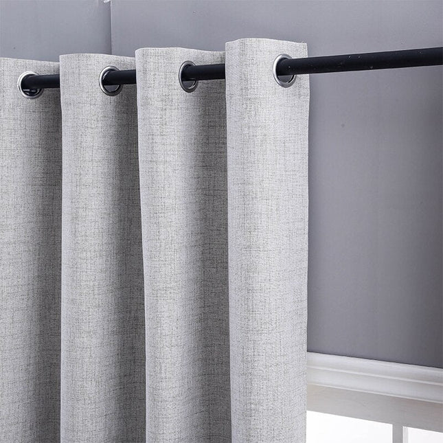 Lysegrå lystett gardin med linstruktur