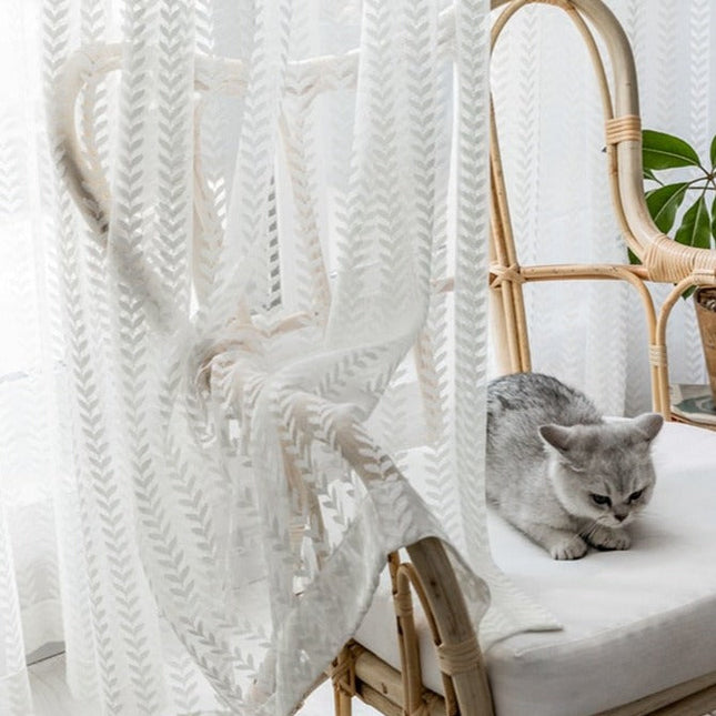 Lysfiltrerende gardin med fiskebeinsmønster