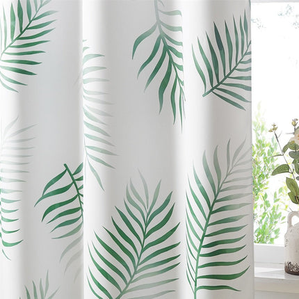 Hvit gardin med grønt palmebladmønster