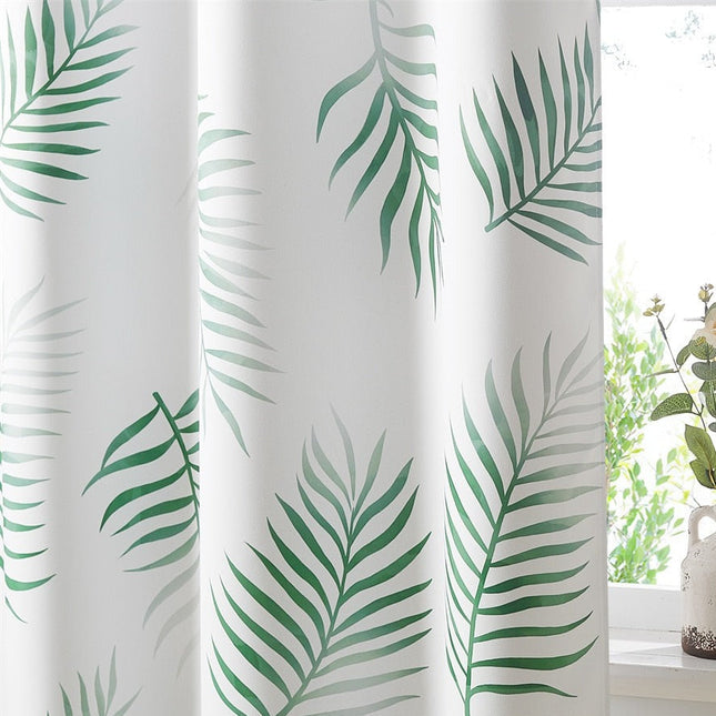 Hvit gardin med grønt palmebladmønster
