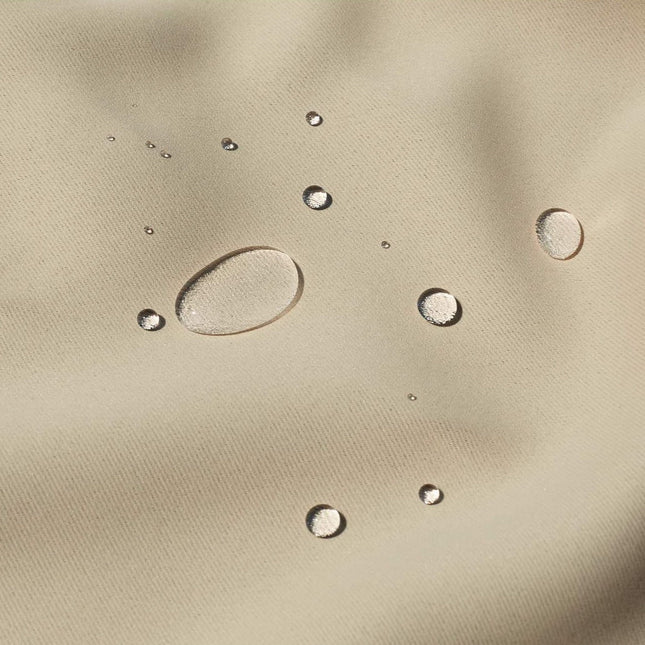 Beige utegardin med rynkebåndkanal