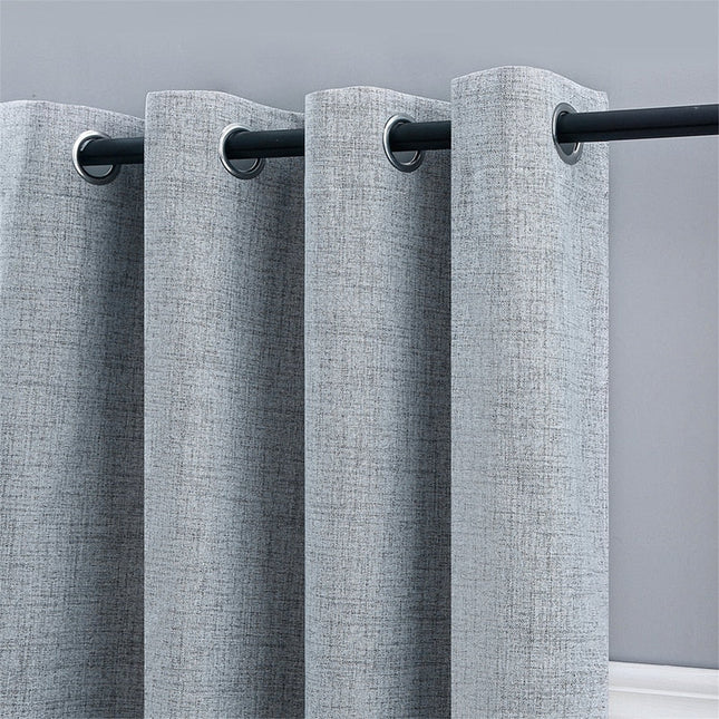 Grå gardin med naturlig linstruktur