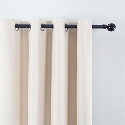 Ensfarget beige mørkleggingsgardin med maljer