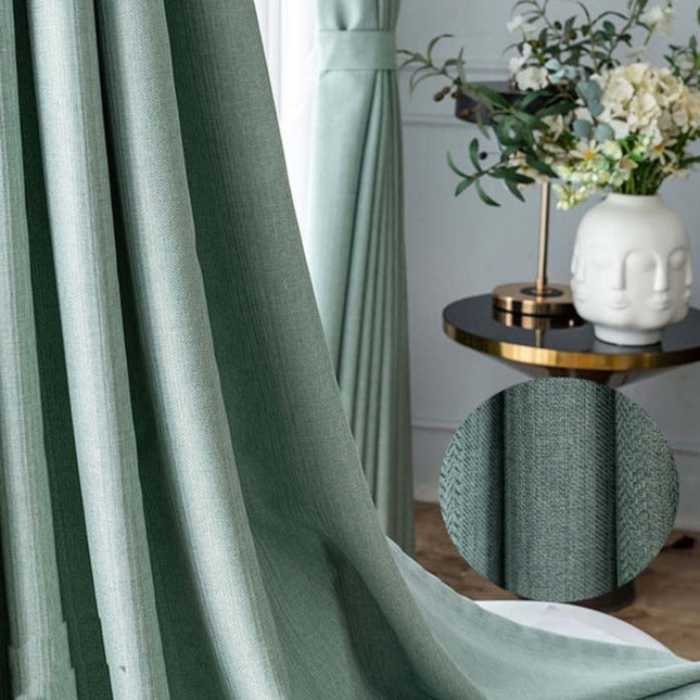 Sjøgrønn lystett gardin med linstruktur