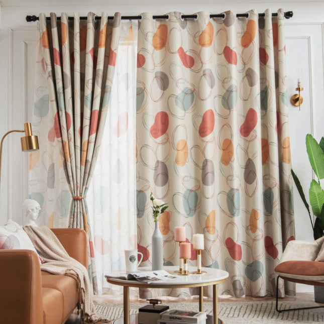 Okerfarget gardin Kotra med abstrakt mønster