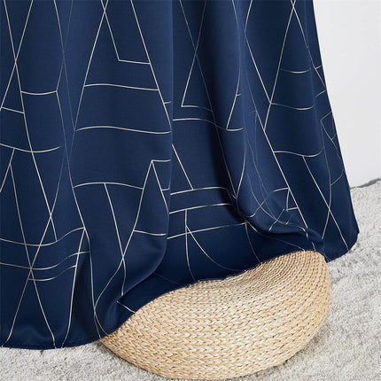 Blå lystett gardin med geometrisk mønster