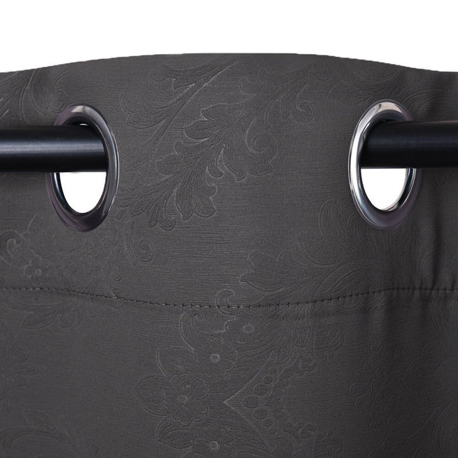 Lystett gardin med preget damaskmønster