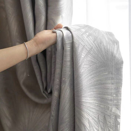 Lystett gardin Seki med diskret palmemønster