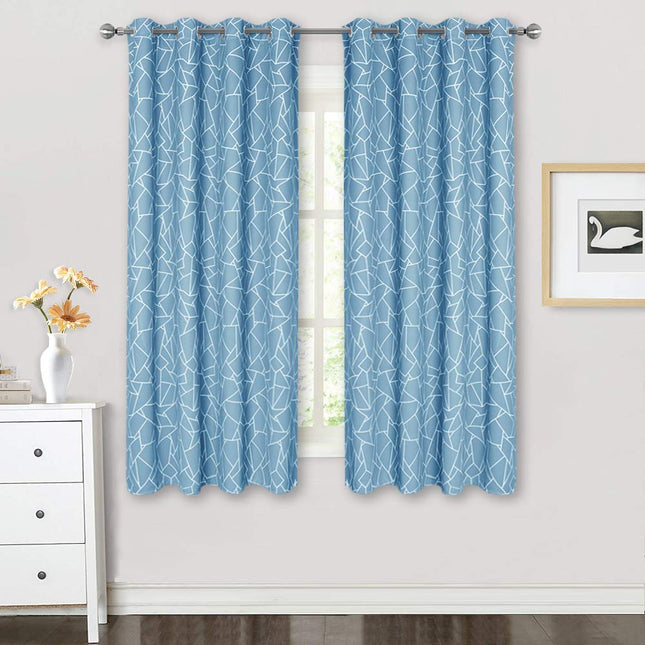 Mørkleggingsgardin med moderne grafisk mønster