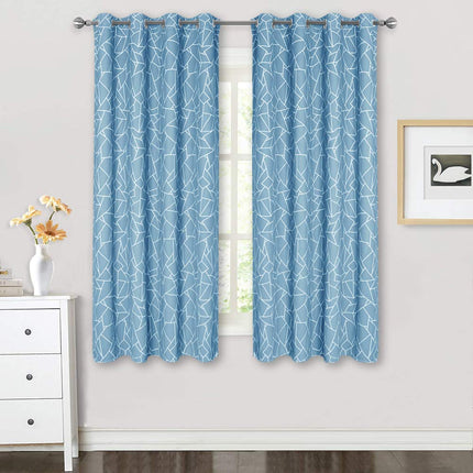 Mørkleggingsgardin med moderne grafisk mønster