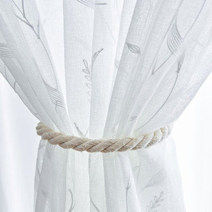 Lett gardin med botanisk mønster