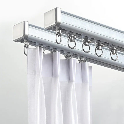 Dobbel gardinskinne for takmontering