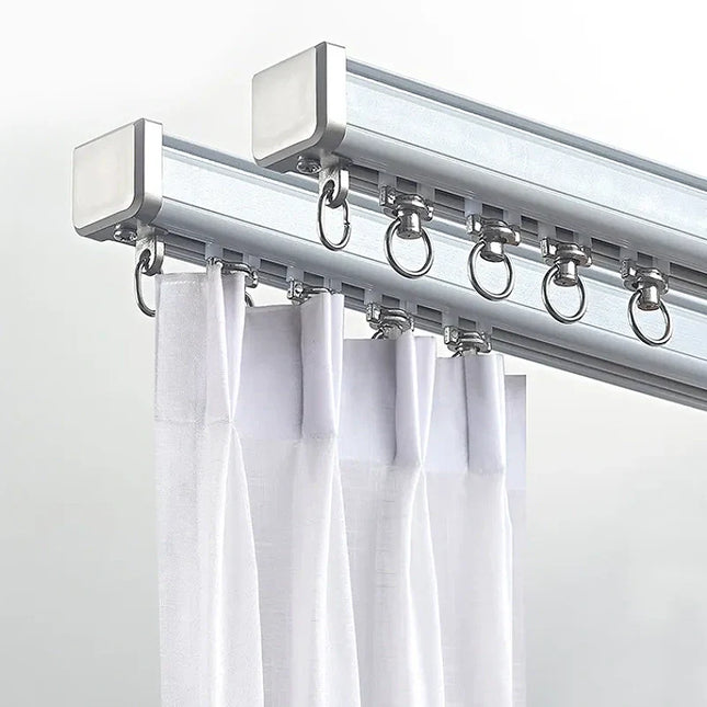 Dobbel gardinskinne for takmontering